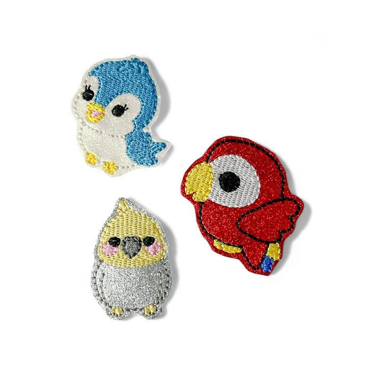 Vinyl Kawaii Bird Badge Topper + Reel - | Happie Potato Image 1