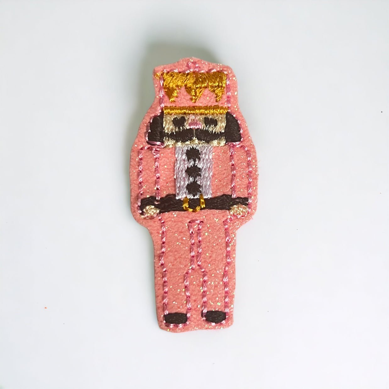 Vinyl Pink Toy Soldier Badge Topper + Reel - | Happie Potato Image 1