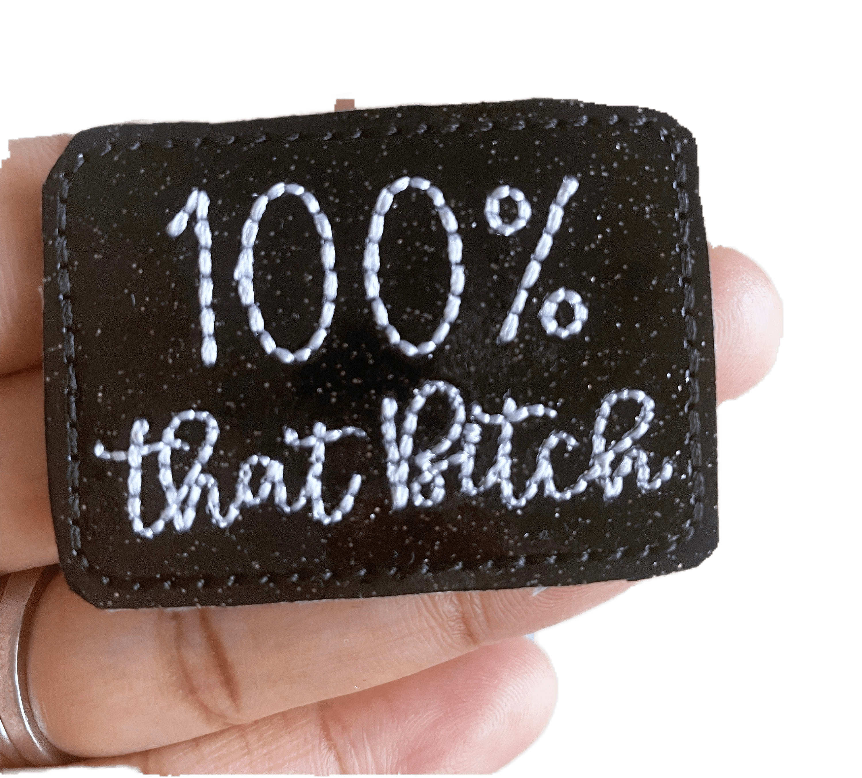 Vinyl 100% That Bitch Badge Topper + Reel - Clothing | Happie Potato Image 1