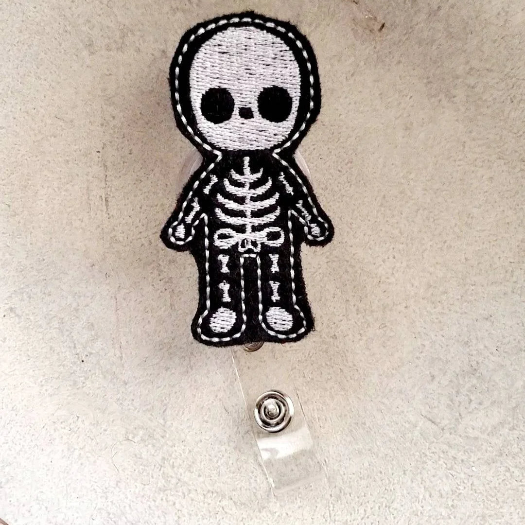 Cute embroidered skeleton badge reel for nurses, teachers, and work ID holders