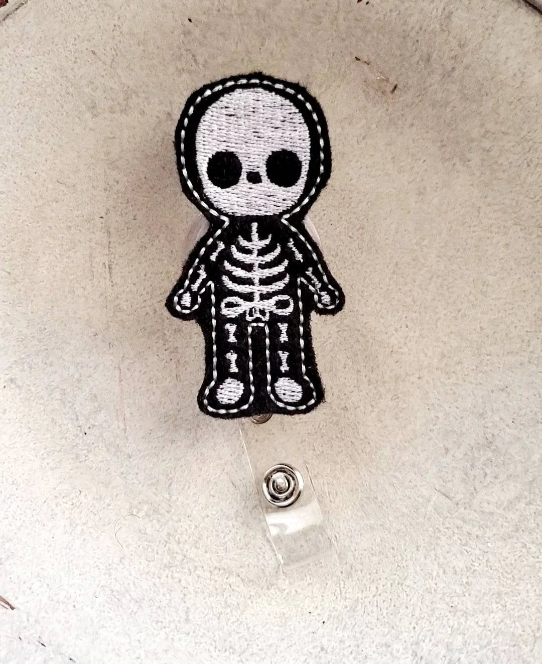 Cute embroidered skeleton badge reel for nurses, teachers, and work ID holders