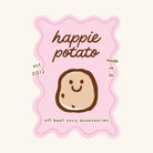 a cheerful potato with a smiley face, surrounded by a pink wavy border and text that reads "happie potato" and "off beat cozy accessories".