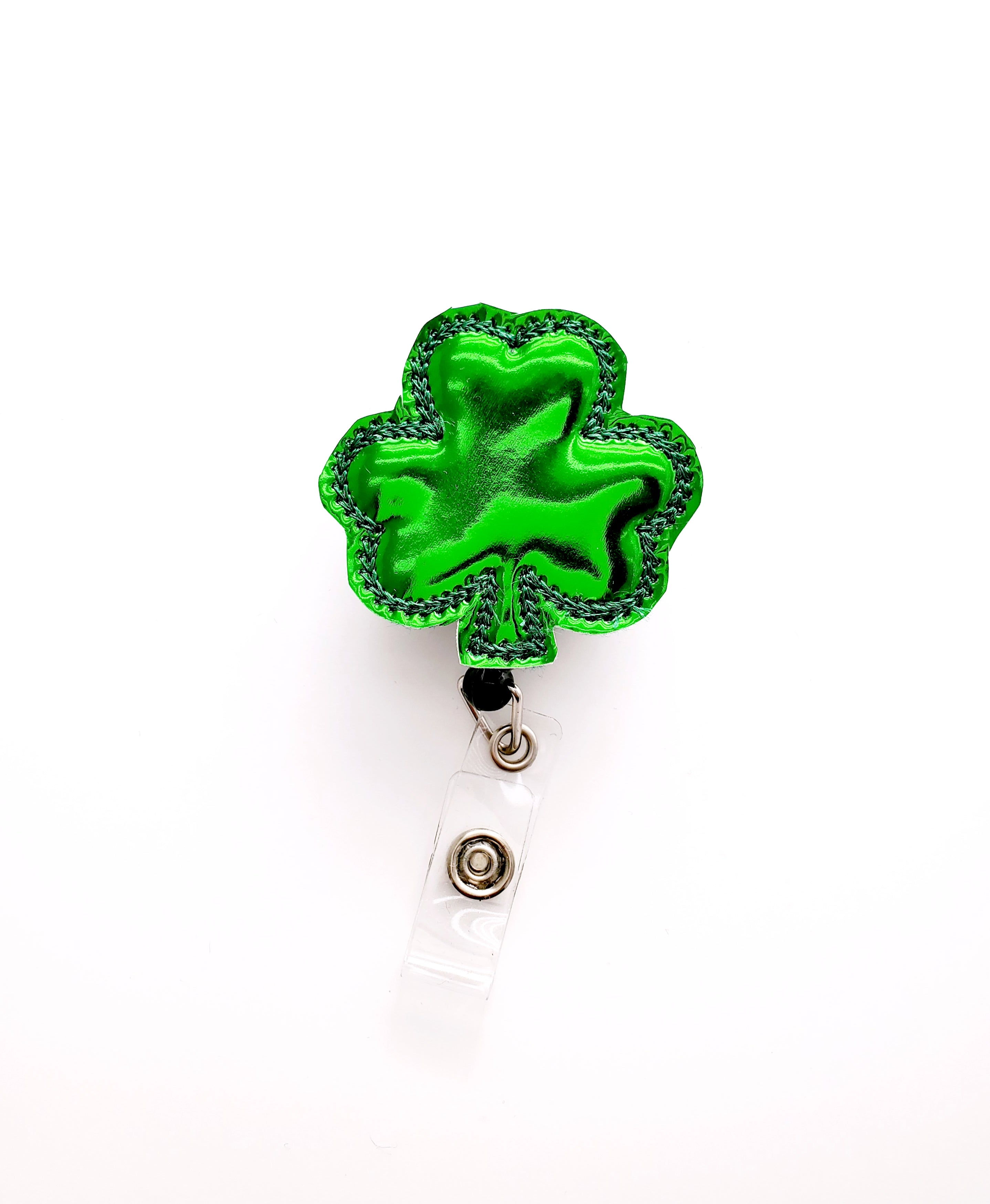 Shiny Green Shamrock Badge Reel - love tan co.